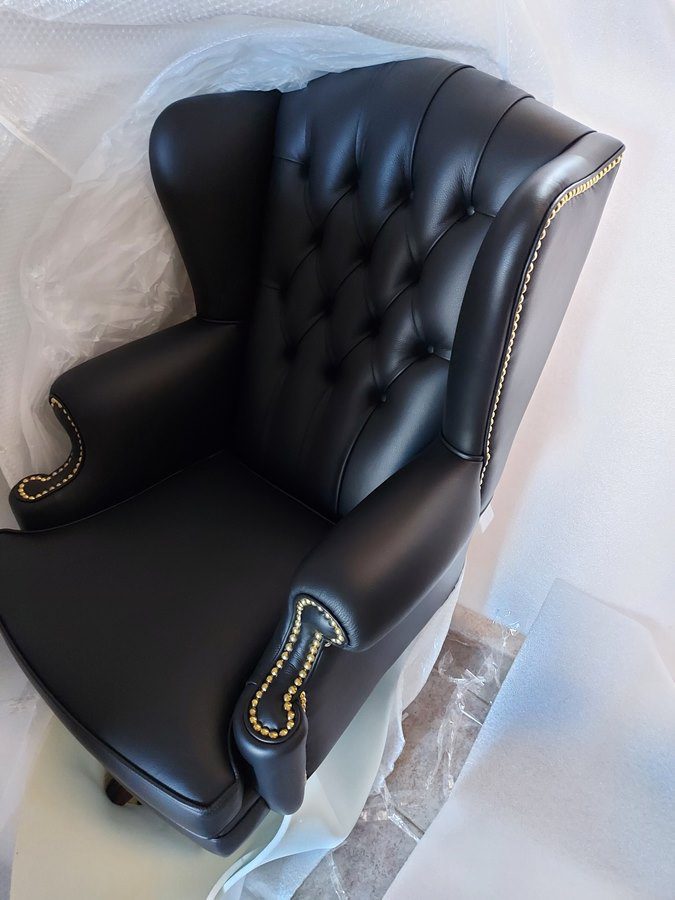 fauteuil en cuir noir pour le bureau du président