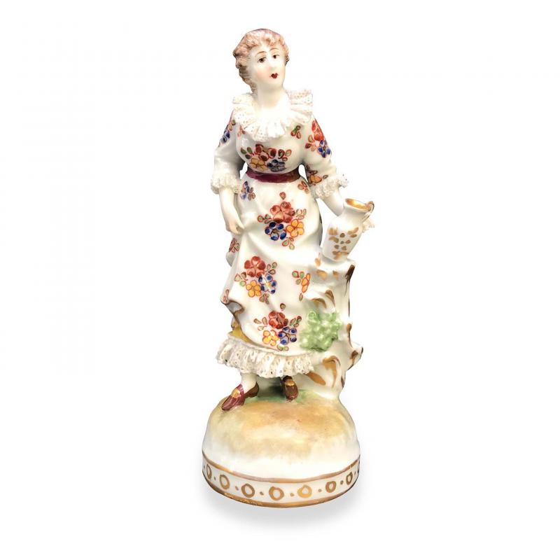 Figurine d'une Femme aux Décorations Florales